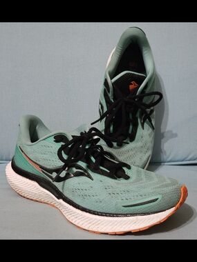 Saucony Green Running Shoes with Orange Accents